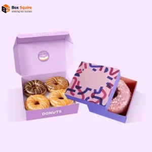 Custom printed donut boxes from Box Squire, showcasing a window-lid design with vibrant brand printing.