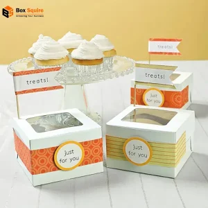 Custom printed mini pastry boxes with clear window by Box Squire with vibrant brand logo and design.