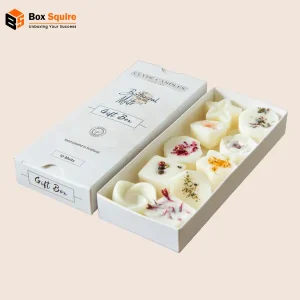 Custom cardboard two piece printed wax melt boxes by Box Squire with vibrant branding and secure closure.