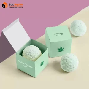 Custom-printed auto bottom tuck top CBD bath bomb packaging box with window, made by Box Squire.