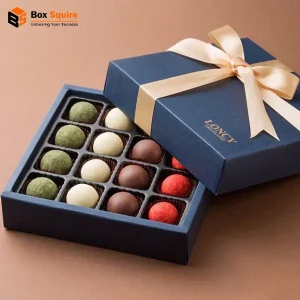 Custom printed chocolate rigid gift boxes by Box Squire, featuring a luxury two-tier design with elegant branding.